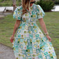 Printed Short Puff Sleeve Midi Dress with a Waist Tie