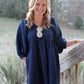 Rosette Adorned V-Neck Mini Dress with a Ric-Rac Trim